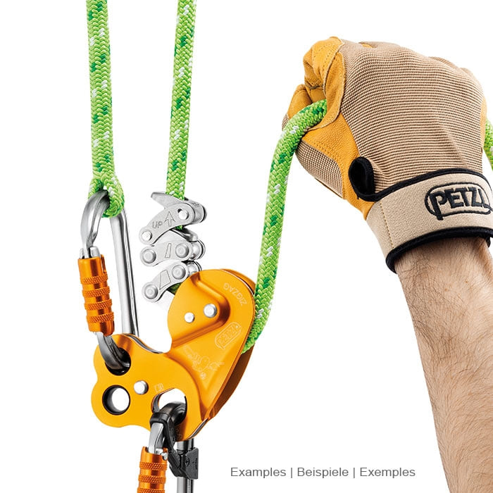 Petzl ZigZag cable system with green climbing rope, two snap hooks and hand with Petzl glove
