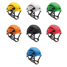 Seven Petzl Vertex Vent helmets in yellow, white, green, orange, black, red and blue with black chin straps and ventilation holes