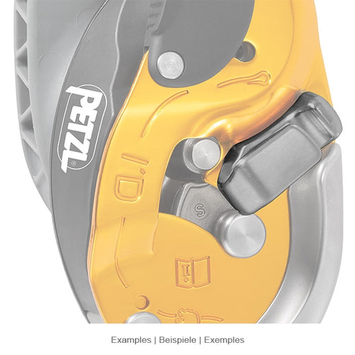 Close-up of the Petzl I'D brake element, mounted on a yellow and grey device with a visible Petzl logo.