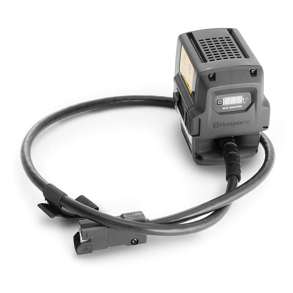 Battery adapter from Husqvarna, black device with air vents, display and connected cable with plug
