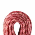 Edelrid Python climbing rope in red and white with black and red patterns, rolled up without packaging