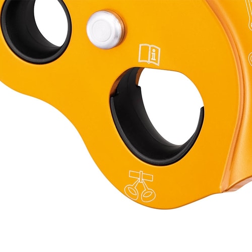 Close-up of the yellow Petzl ZigZag cable system with black plastic inserts and white symbols