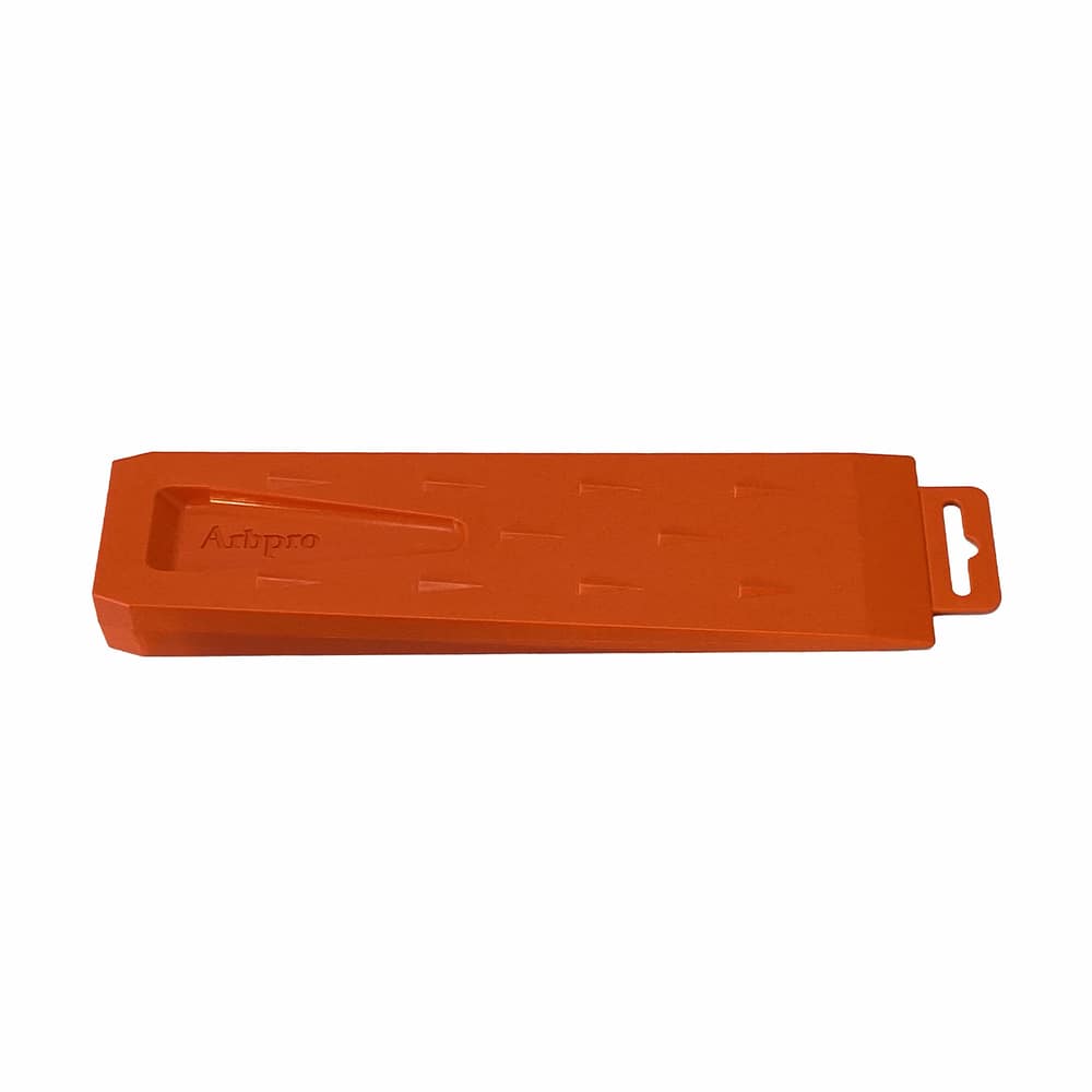 Orange ArbPro Felling Wedge 260, lying with grip hole on a white background