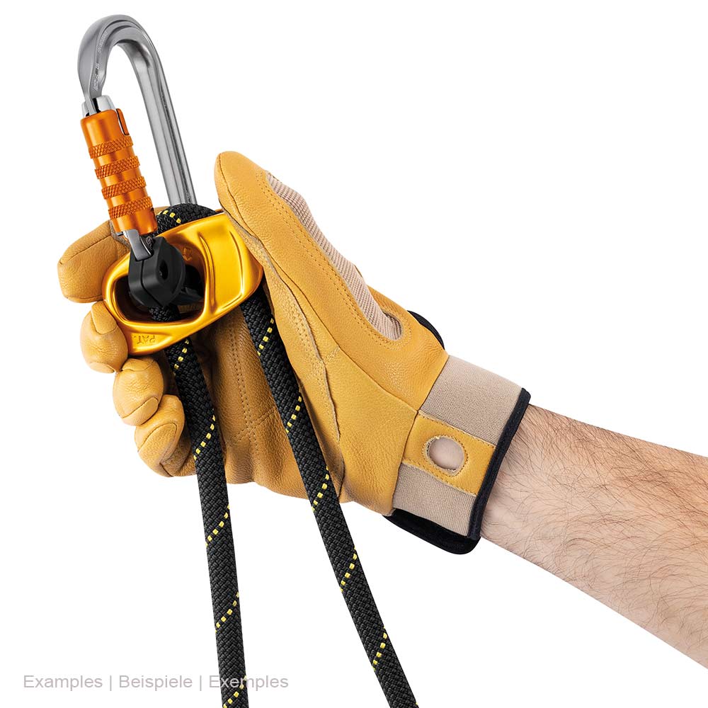 Hand with yellow work glove holding the yellow metal device with black rope and a silver carabiner
