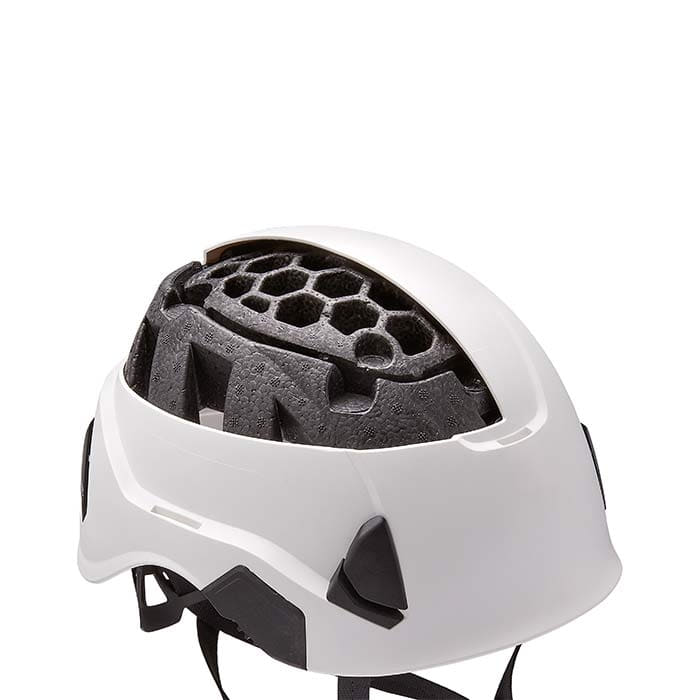 White PETZL Strato Vent helmet with visible inner shell made of black foam