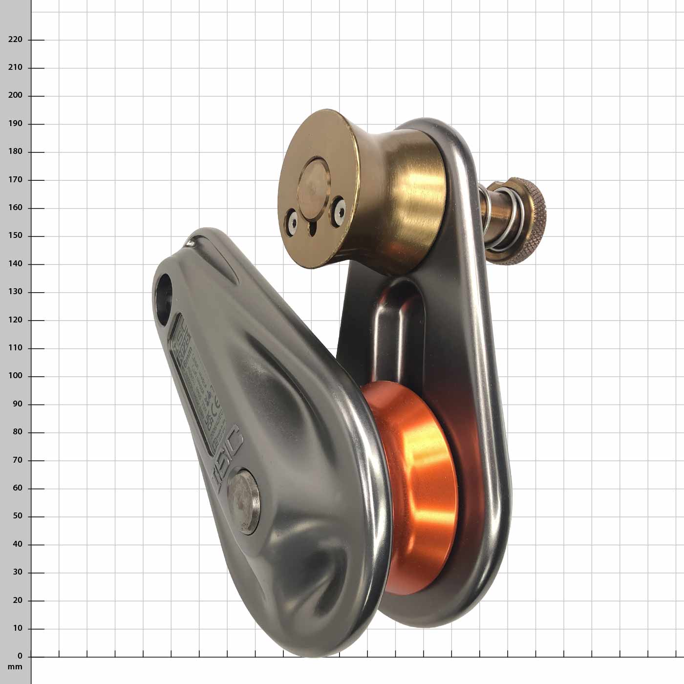 Small Rigging Pulley, oblique view with orange roller, brass roller and silver metal housing, product name and manufacturer information visible on the back