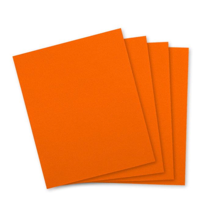 Patchwork fabric in orange, four square pieces of fabric on top of each other