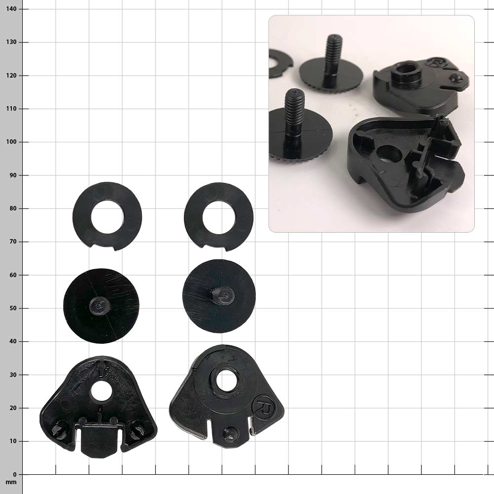 Kask visor mounting kit with several black plastic parts, including two round discs with pins and two triangular brackets, arranged on a checkered background