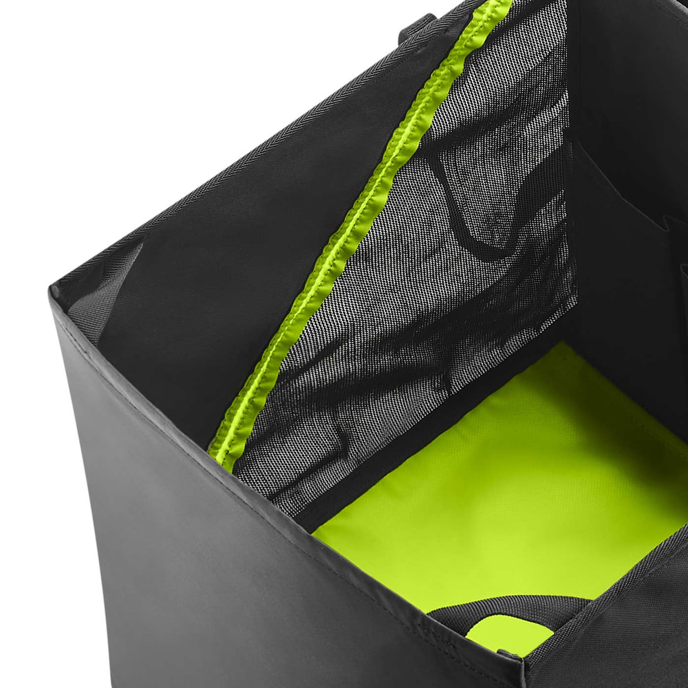 Close-up of the inside of the black and green bag with mesh fabric and green accents