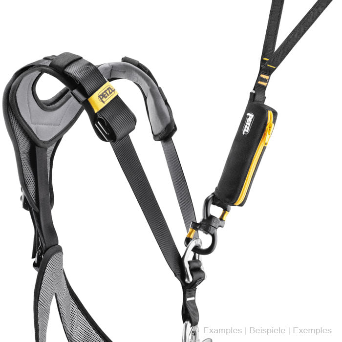 Climbing harness by Petzl in black with yellow details and various straps
