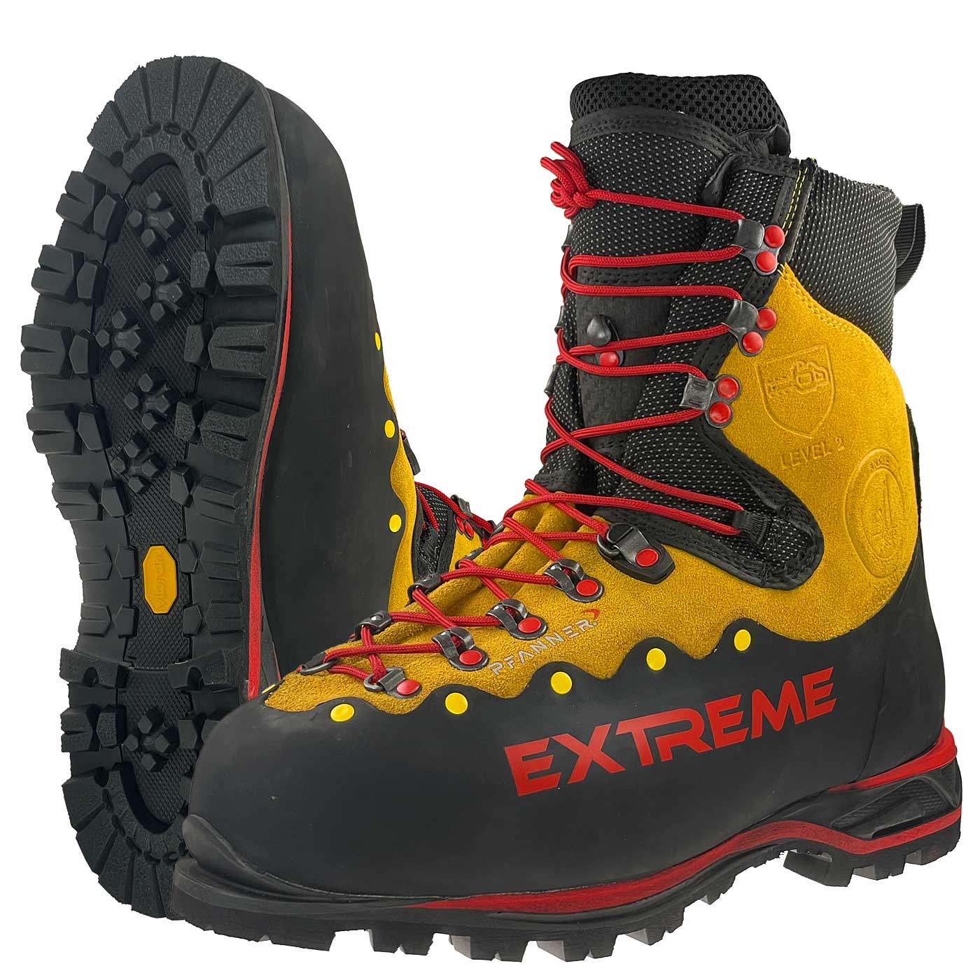 Zugspitze Extreme mountain boots in yellow and black with red laces, treaded sole and "EXTREME" lettering in red on the side