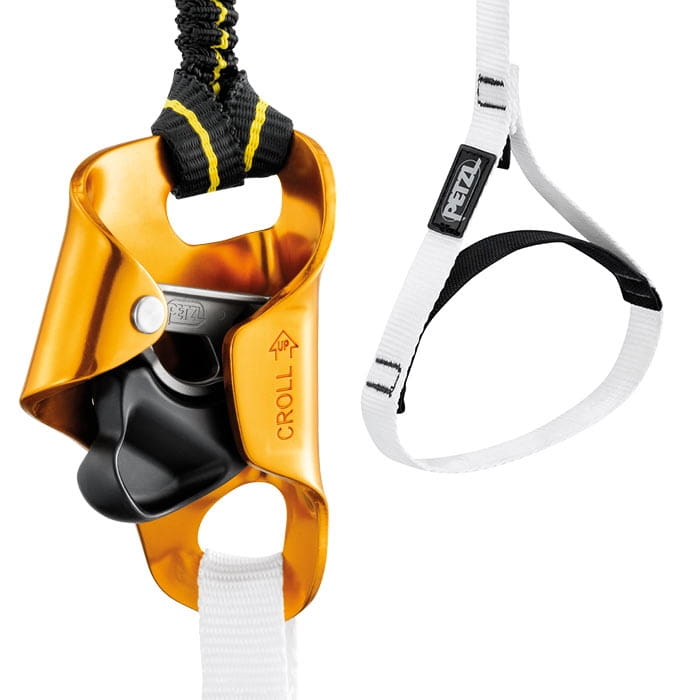 Close-up of Petzl's yellow Croll ascent aid device with black and white ribbon