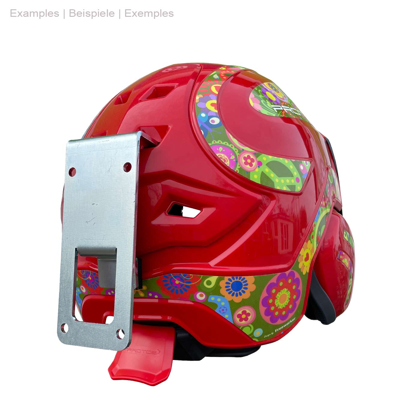 Red PROTOS® helmet with colorful floral pattern and mounted silver PROTOS® wall mount, rear view