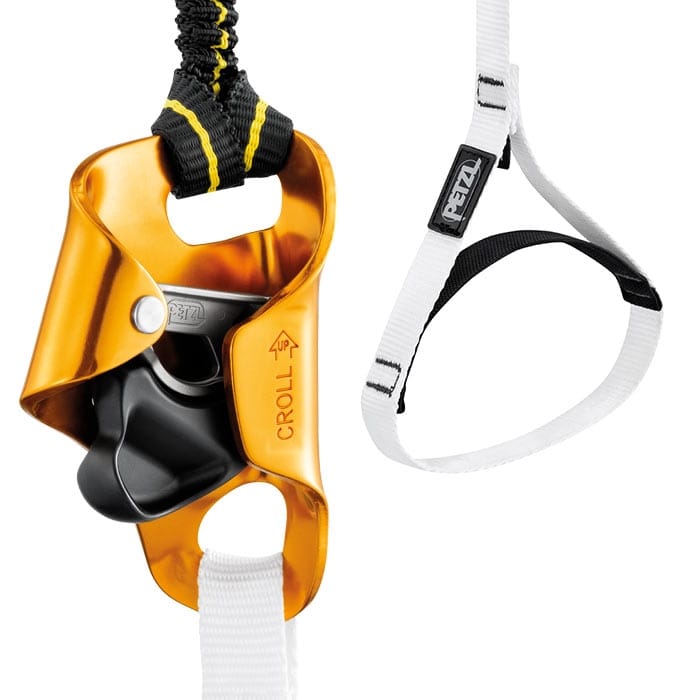 Close-up of Petzl's yellow Croll ascent aid device with black and white ribbon