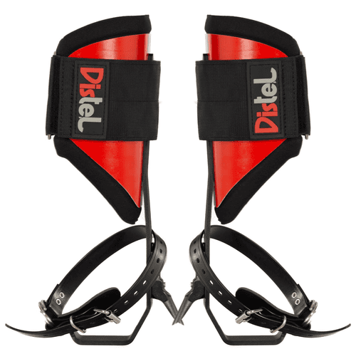 Distel Steel Classic, two red and black metal spur shoes with black straps and the lettering "Distel" on the black Velcro fasteners