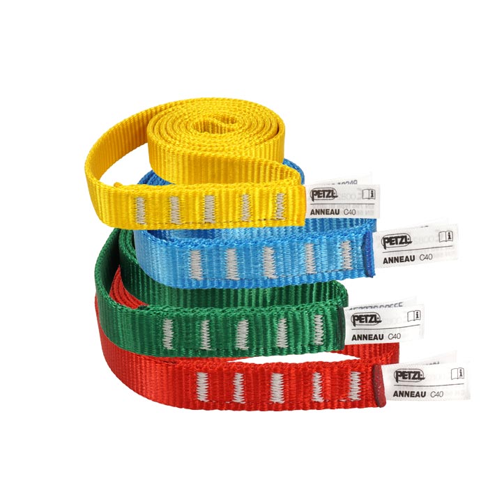 Four rolled-up PETZL Anneau C40 loops in yellow, blue, green and red stacked on top of each other
