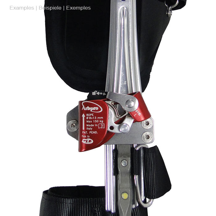 Quickstep Spurs by Arbpro, red and silver metal part with inscription, attached to silver device with black strap