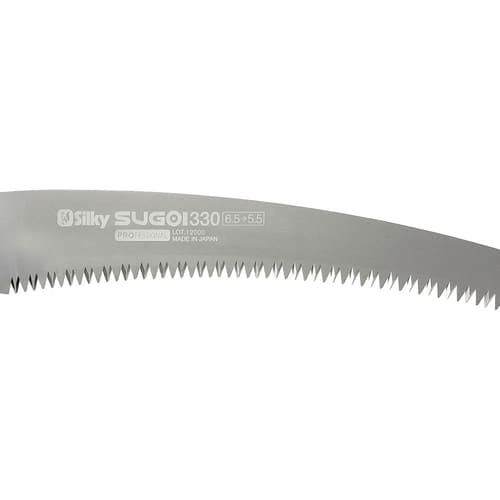 Close-up of the curved Sugoi 330-6.5-5.5 saw blade from Silky with visible teeth and printed manufacturer's lettering and model number on the metal blade