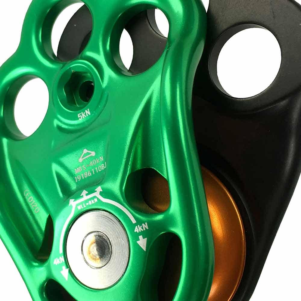 Rigger Pulley Close-up of Green Pulley with Lettering and Orange Reel in Black Case