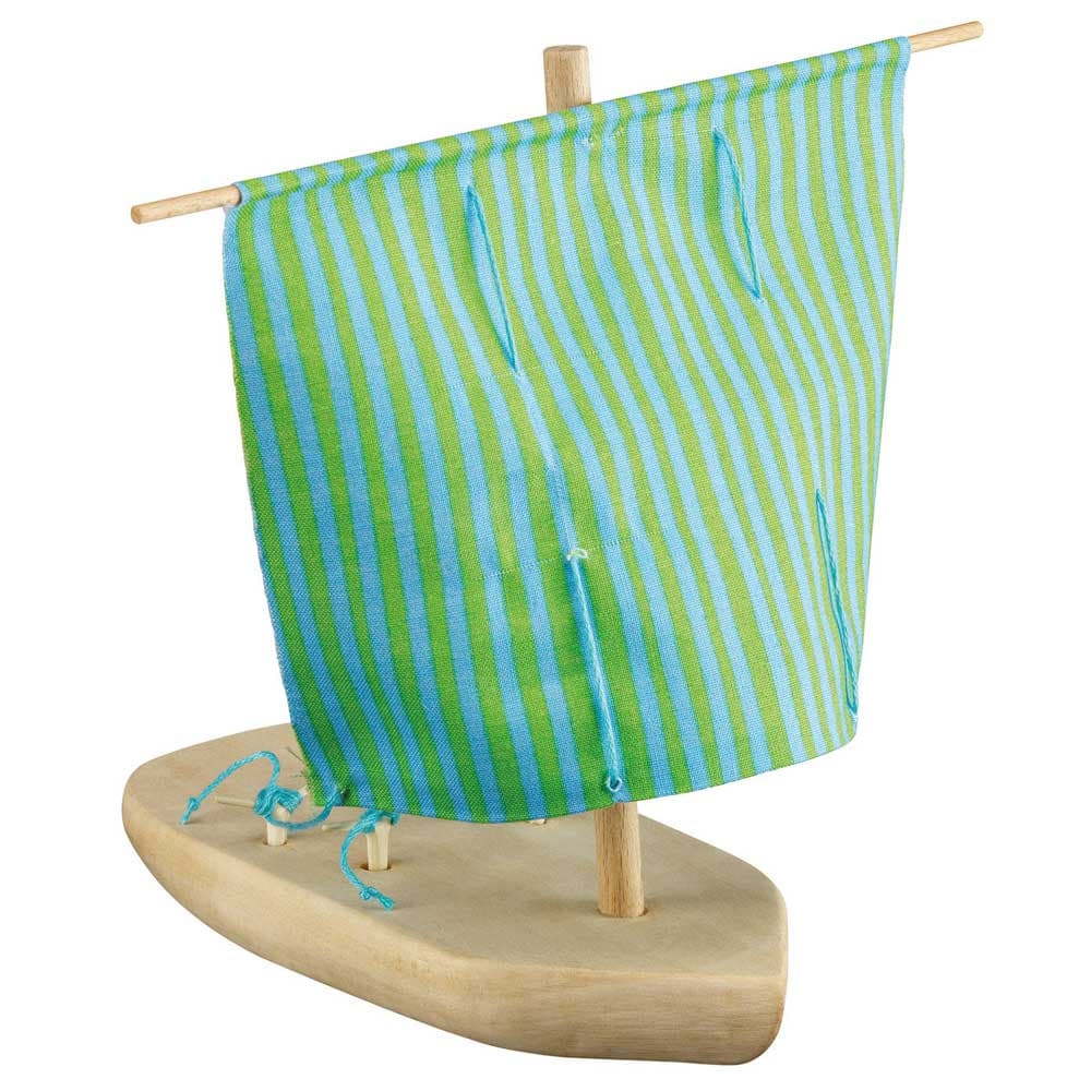 Kosmos Schnitz Set finished wooden boat with mast and blue-green striped sail, sail attached to mast and boat