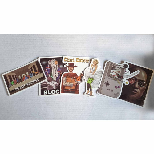 Six individual stickers from the ARB Fiction Pack Vol. 2, including "THE LAST SRT SUPPER" with figures at a table, "BLOCKY" with a figure in a white robe, Clint Eatswood with a chainsaw, woman in a white dress and green pants, Gameboy-like device with cha