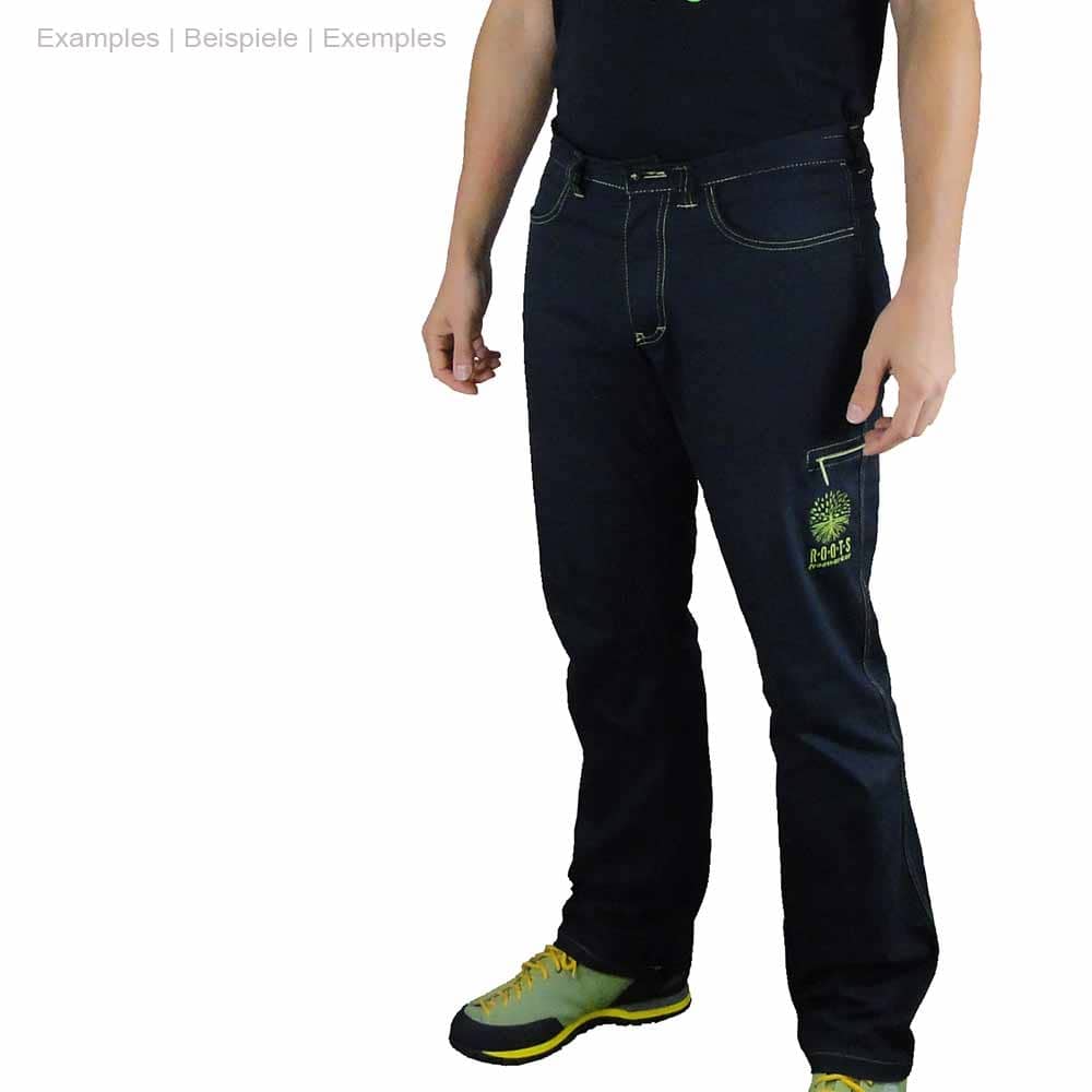 Roots Pure outdoor pants in black are worn by one person, visible legs, hips and hands, green seam and green embroidery of a tree with lettering "ROOTS freeworker" on the trouser leg