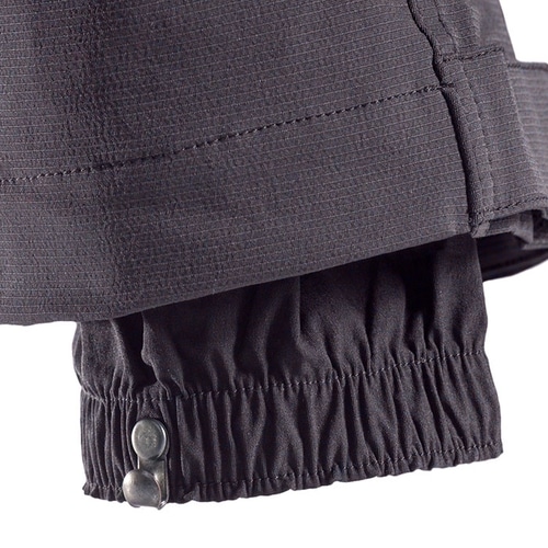 SIP climbing pants, close-up of the trouser leg hem with elastic waistband and two metal buttons for closure