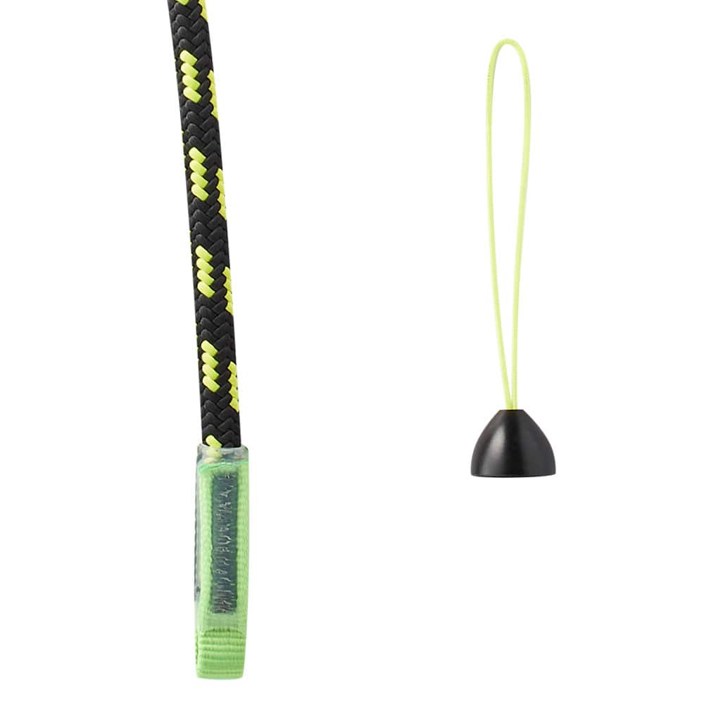 Close-up of a green end of a black and yellow rope next to a small black cap with yellow ribbon of the Adjustable Cambium Saver