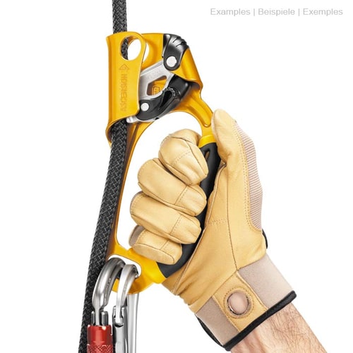 Ascension R in yellow and black with handle, metal parts, rope and carabiner, held by one hand with beige glove