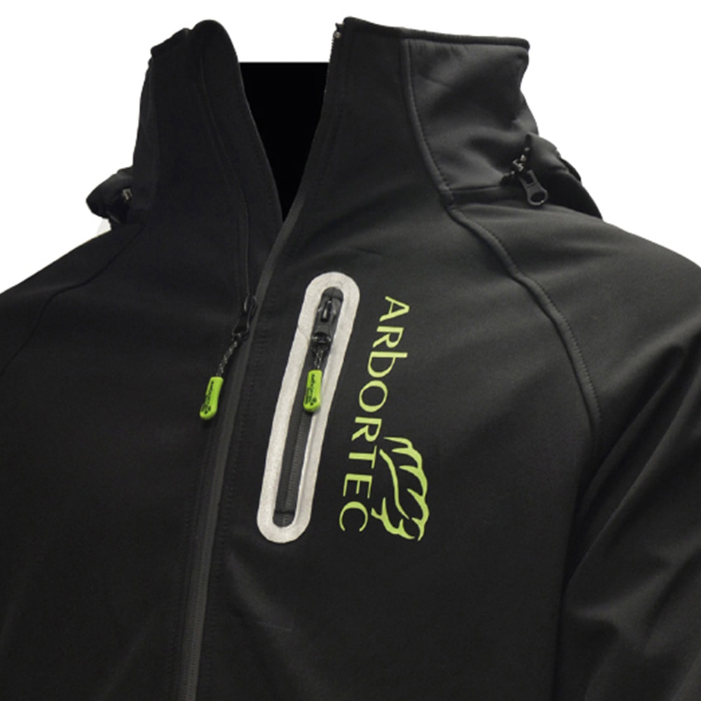 Close-up of Arbortec's black Caiman jacket with green logo and zippers on the chest and sides