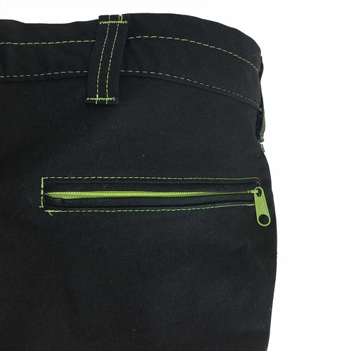 Close-up of the back of the Roots Pure outdoor pants in black with green zipper and green stitching on the back pocket area