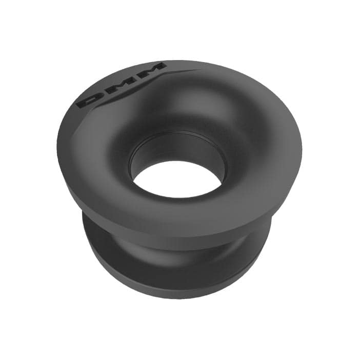 A black Grommet part with the inscription "DMM" on a white background, product name Grommet