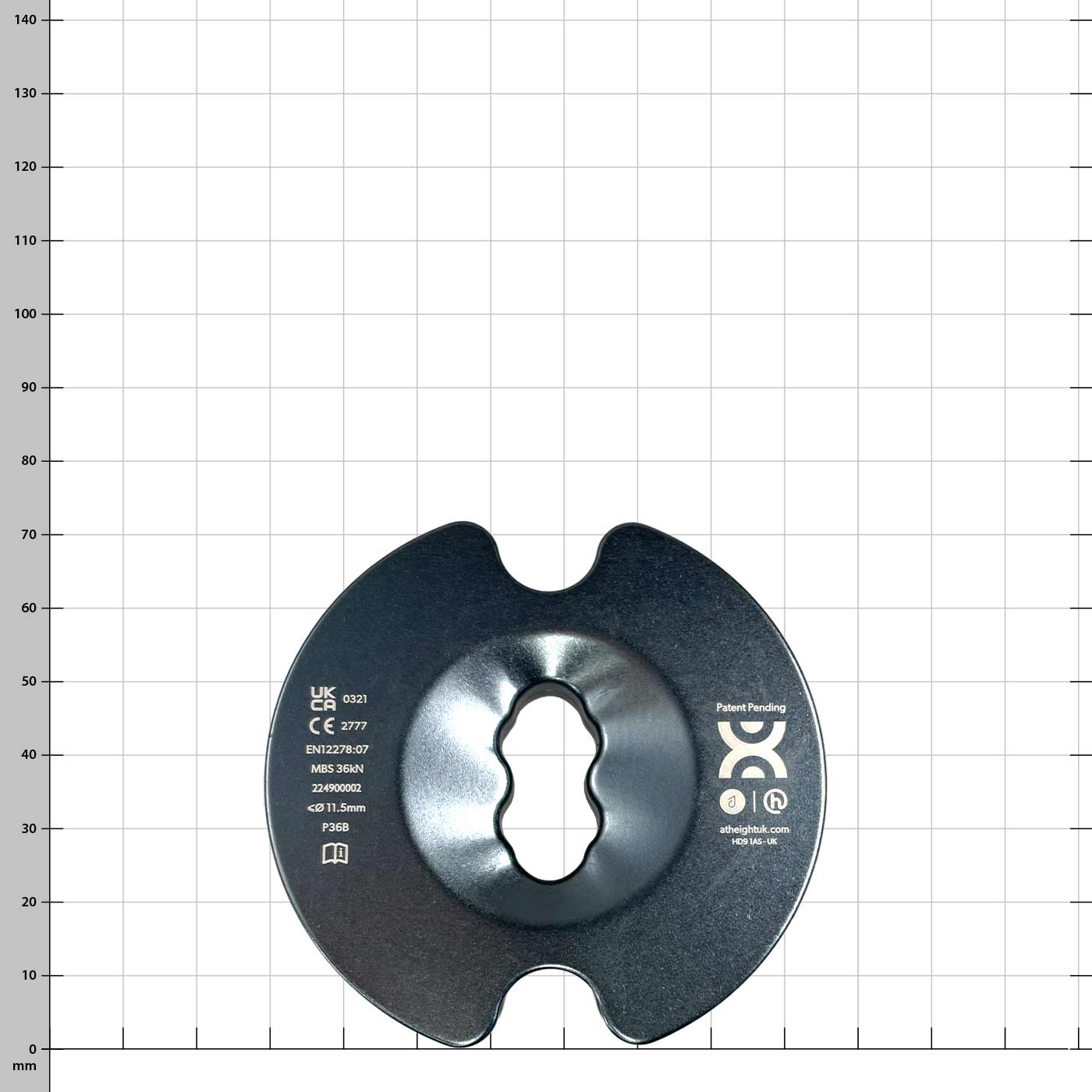 PulleyOne Pro black disc with print and central recess against white background with grid