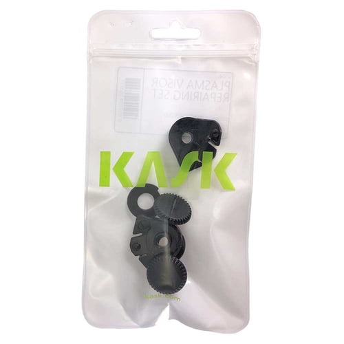 Kask visor mounting set in transparent resealable plastic packaging with green Kask logo and several black plastic parts visible inside.