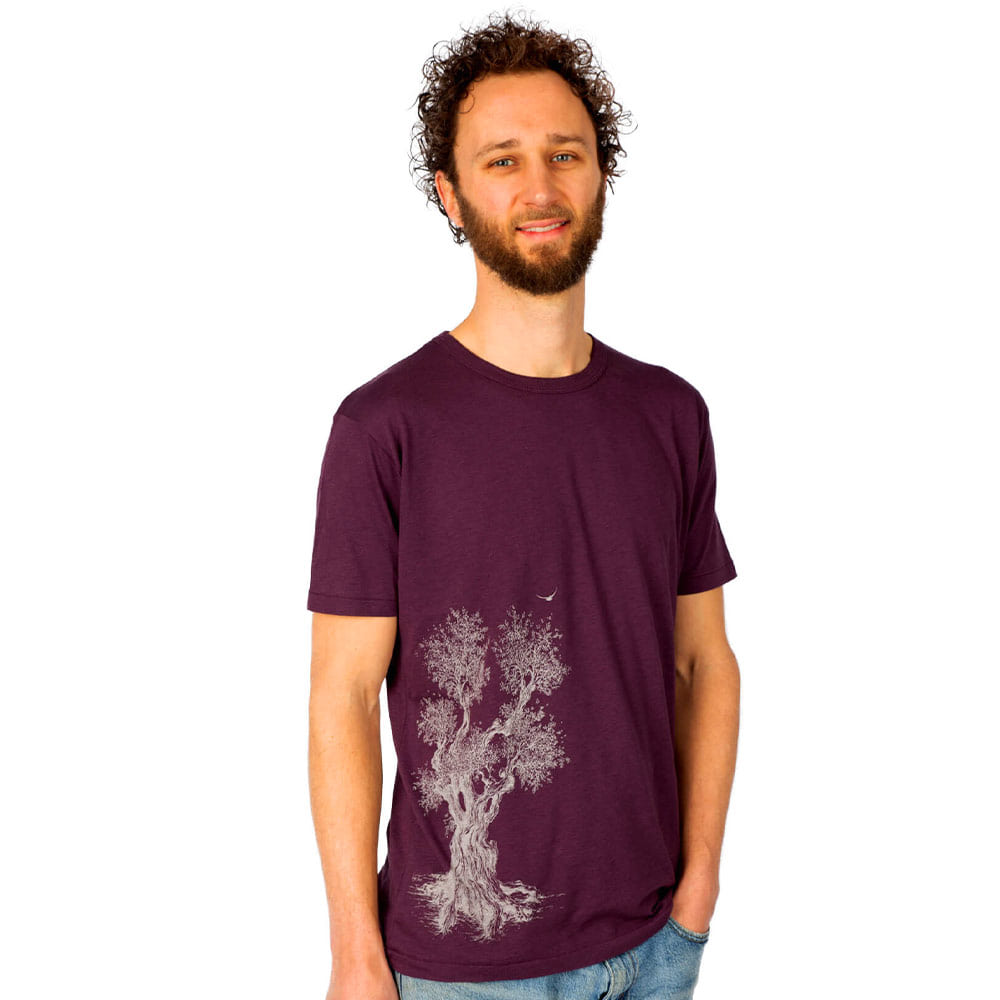 Man wearing a purple Olive Tree T-shirt with a white tree print on the front, Product Name Olive Tree T-Shirt