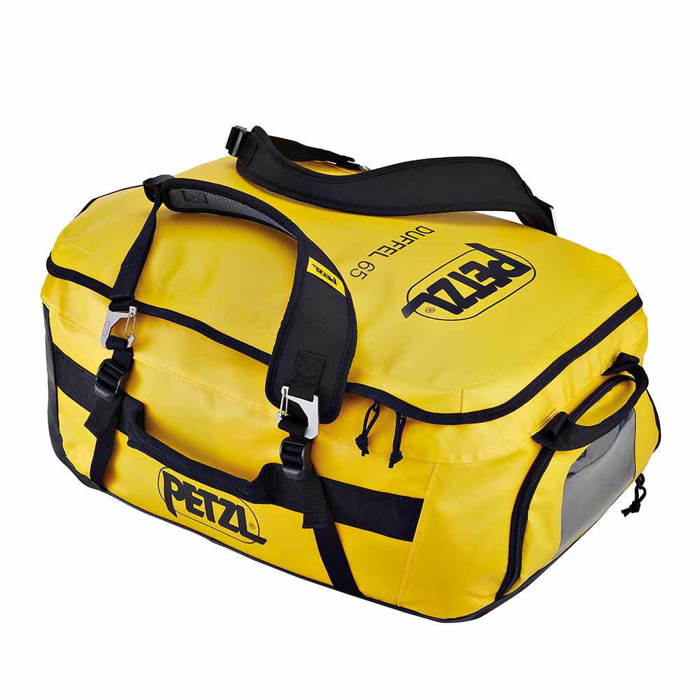 Yellow PETZL Duffel 65 bag lies flat, visible black straps and zippers, PETZL logo on the side