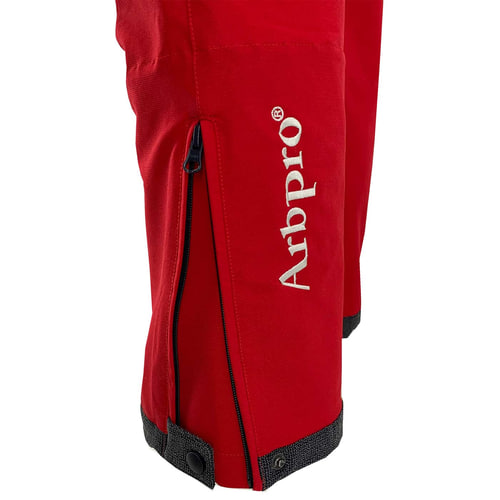 Close-up of Arbpro's red Climb Tech Delta hem with zipper and snap closure