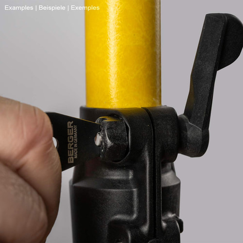 Adjustment key for GRP rods from BERGER is used on a yellow rod on a black bracket, on the key is written BERGER Made in Germany