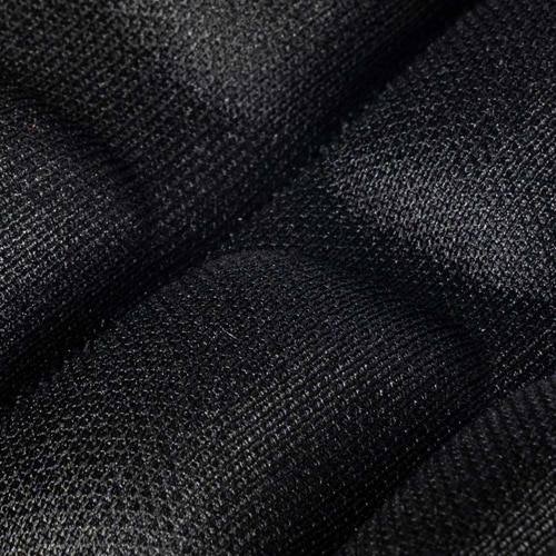 Thistle upholstery Velcro close-up of a black textured Velcro closure with padded textile