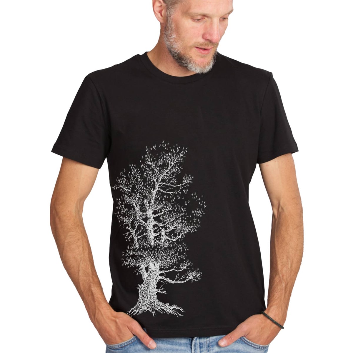 Man wearing Stone Pine Tree T-shirt in black with white tree design, looking to the right