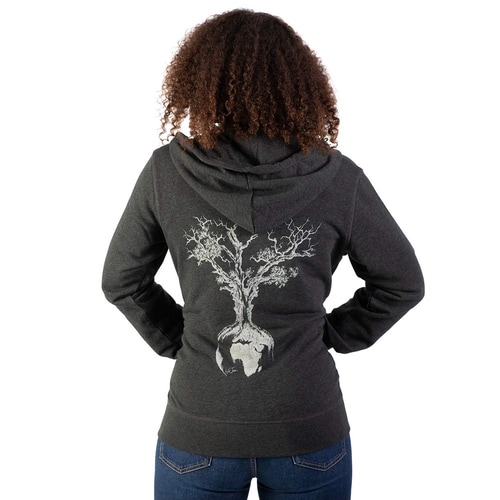 World tree hoodie, back view of a woman, dark gray hoodie with large white tree and earth print on the back