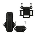 Caiman by DMM, black plastic parts with screws on a white background, including clip and brackets