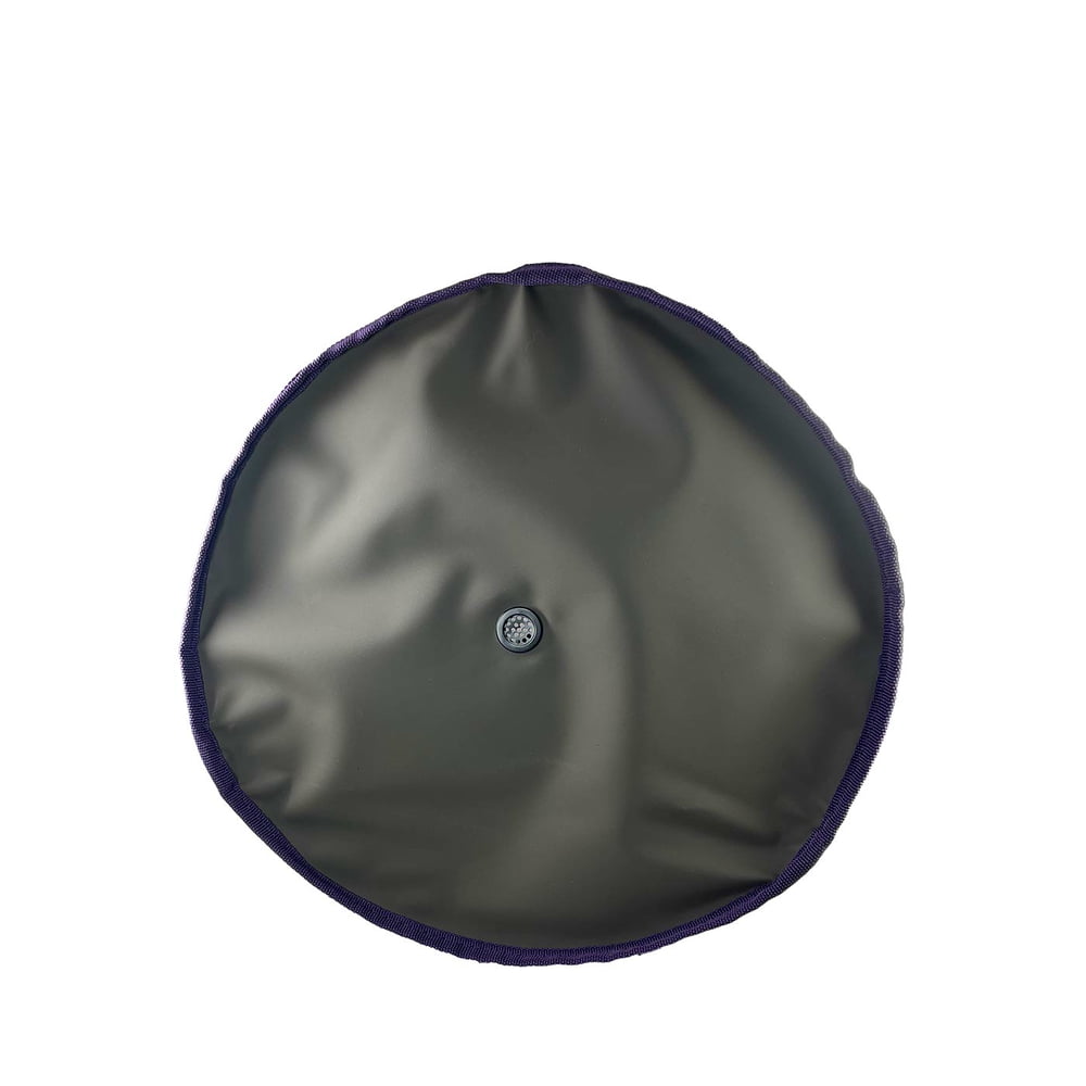 Genius Tool Bucket 2, round grey base with purple border and small black valve in the middle