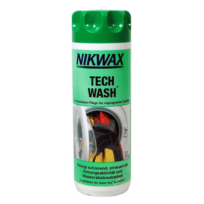 Nikwax Tech-Wash bottle with green lid and green label with text and image of a washing machine with clothes on it