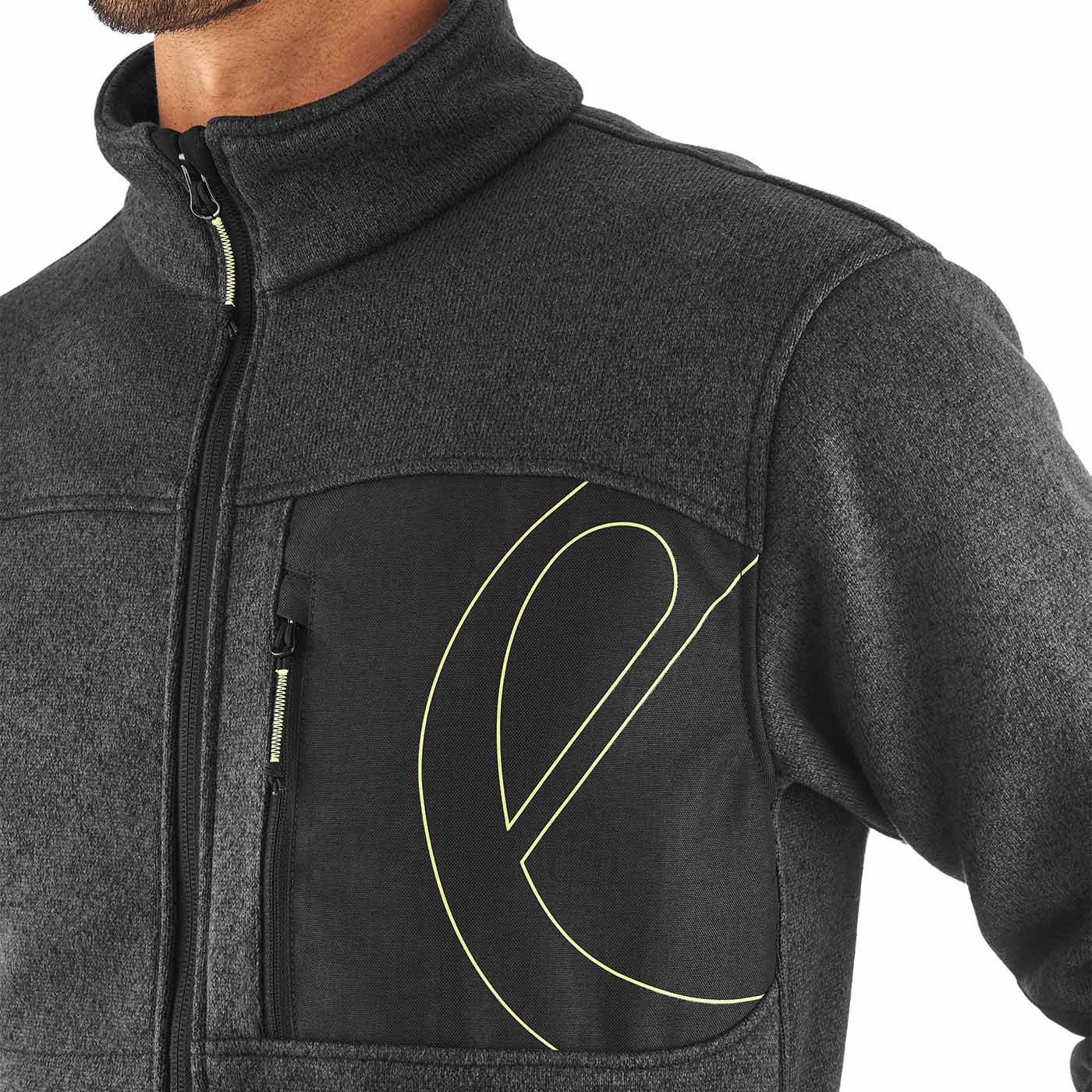 Close-up of Mylodon Jacket chest pocket with zipper and yellow line drawing, partial view of the torso