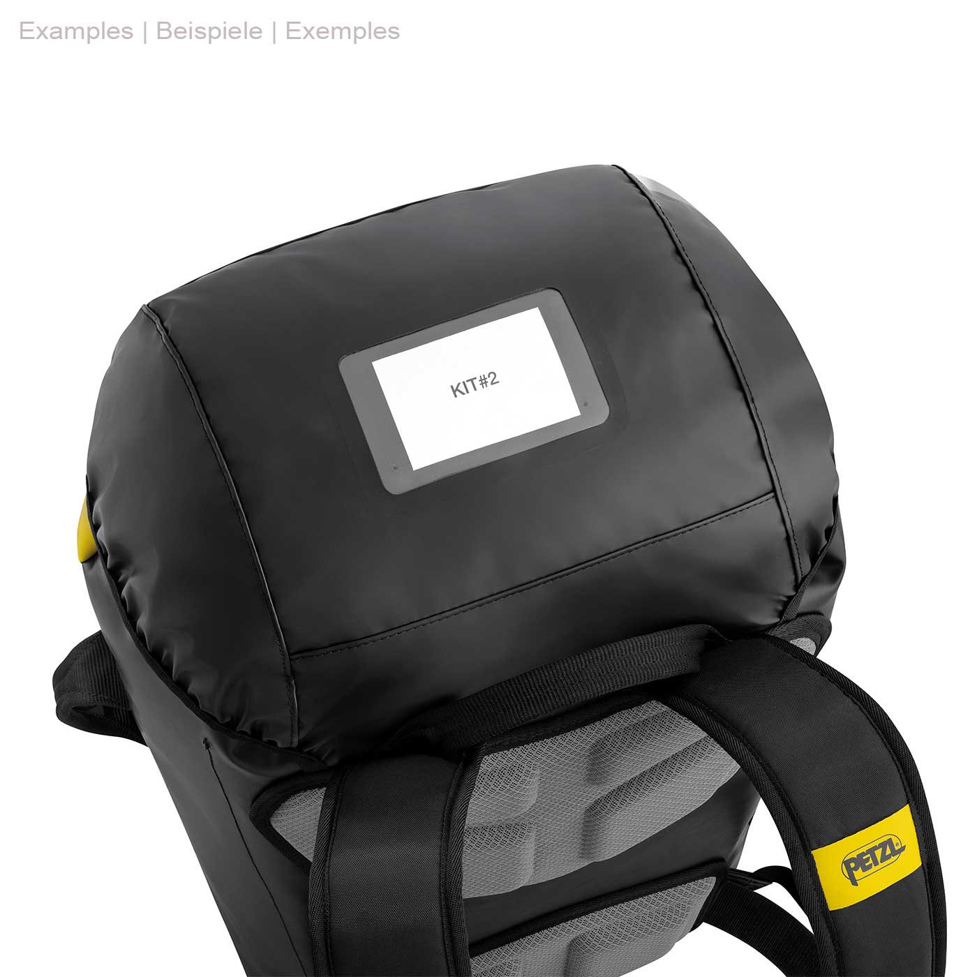 Top view of the Petzl Transport 45 backpack in black with translucent name tag and yellow Petzl logo on the strap