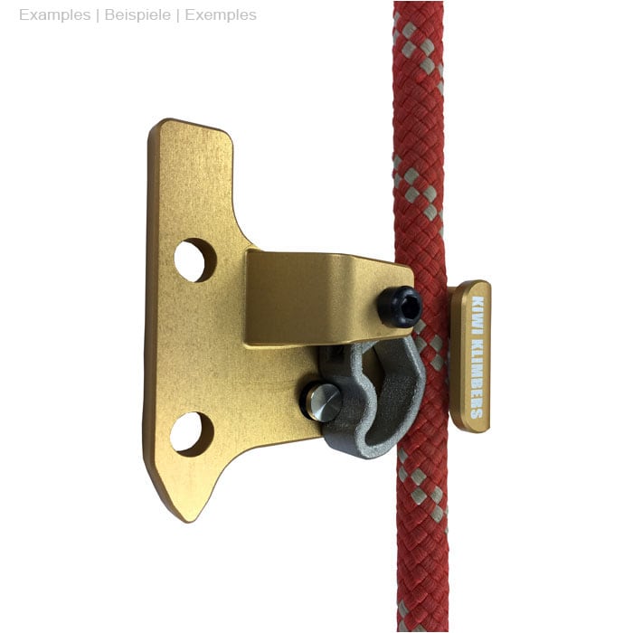 SpikeSender 2 R with red rope, gold-coloured metal part with two drill holes and black screw, "KIWI KLIMBERS" lettering visible, slightly different perspective