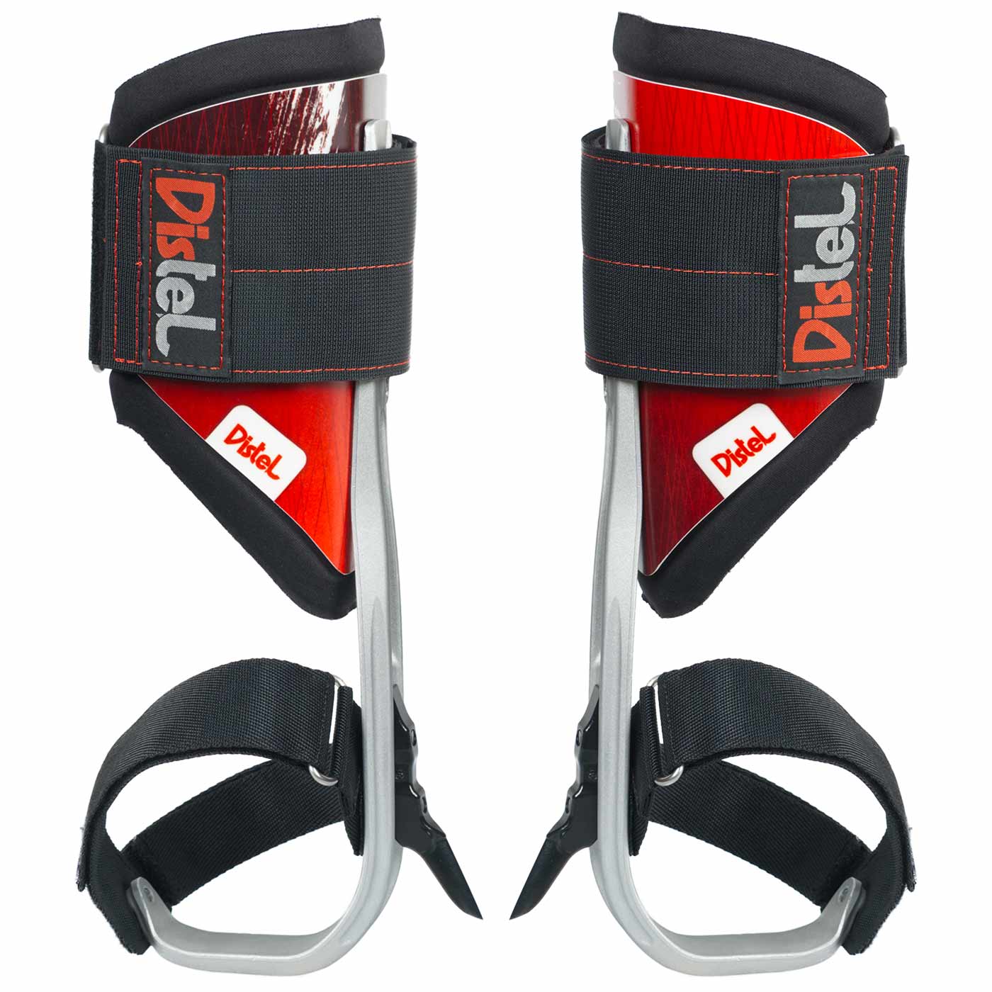 Distel Alu 3.1 Velcro by Distel, two foot spurs with black Velcro and red wooden parts, slightly photographed from a different perspective