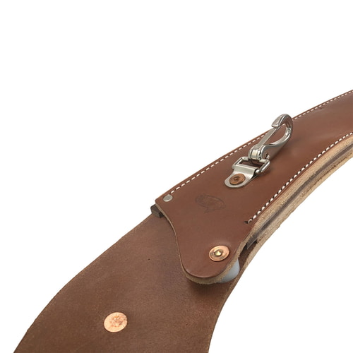 Close-up of the KR leather holster with metal hooks, rivets and visible white stitching