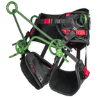 Side view of the treeMOTION Essential X tree climbing harness from Teufelberger with black and red elements and green metal rings